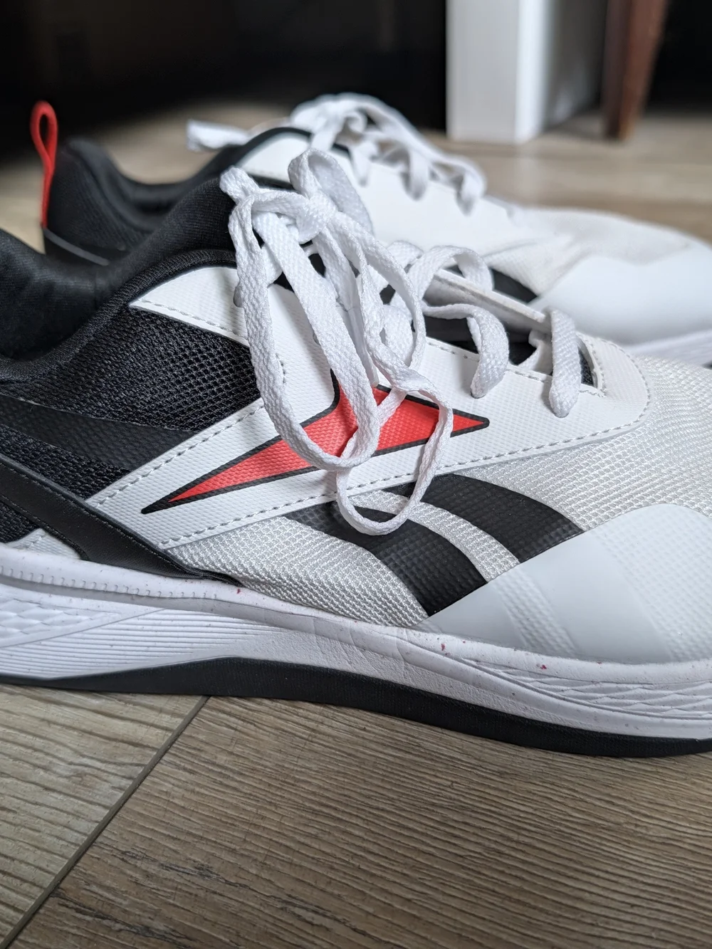 Men's Lace- Up Reebok Nano Sneakers.
